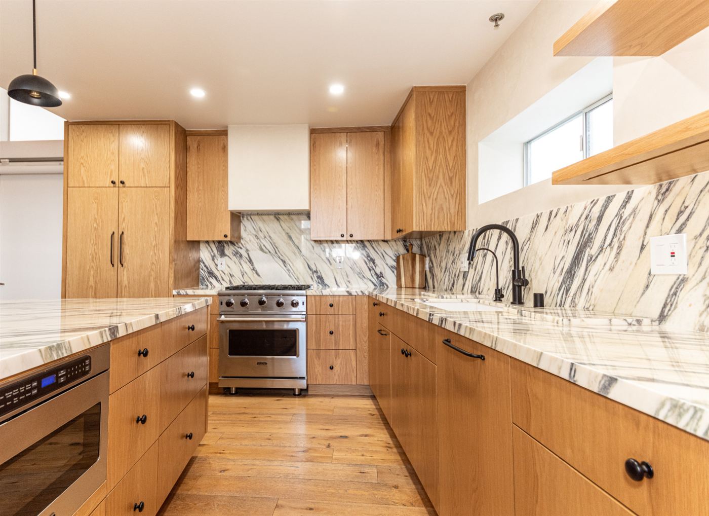 Marina del Rey kitchen remodel â€” warm wood cabinetry with clean modern lines, by ARKO Remodeling