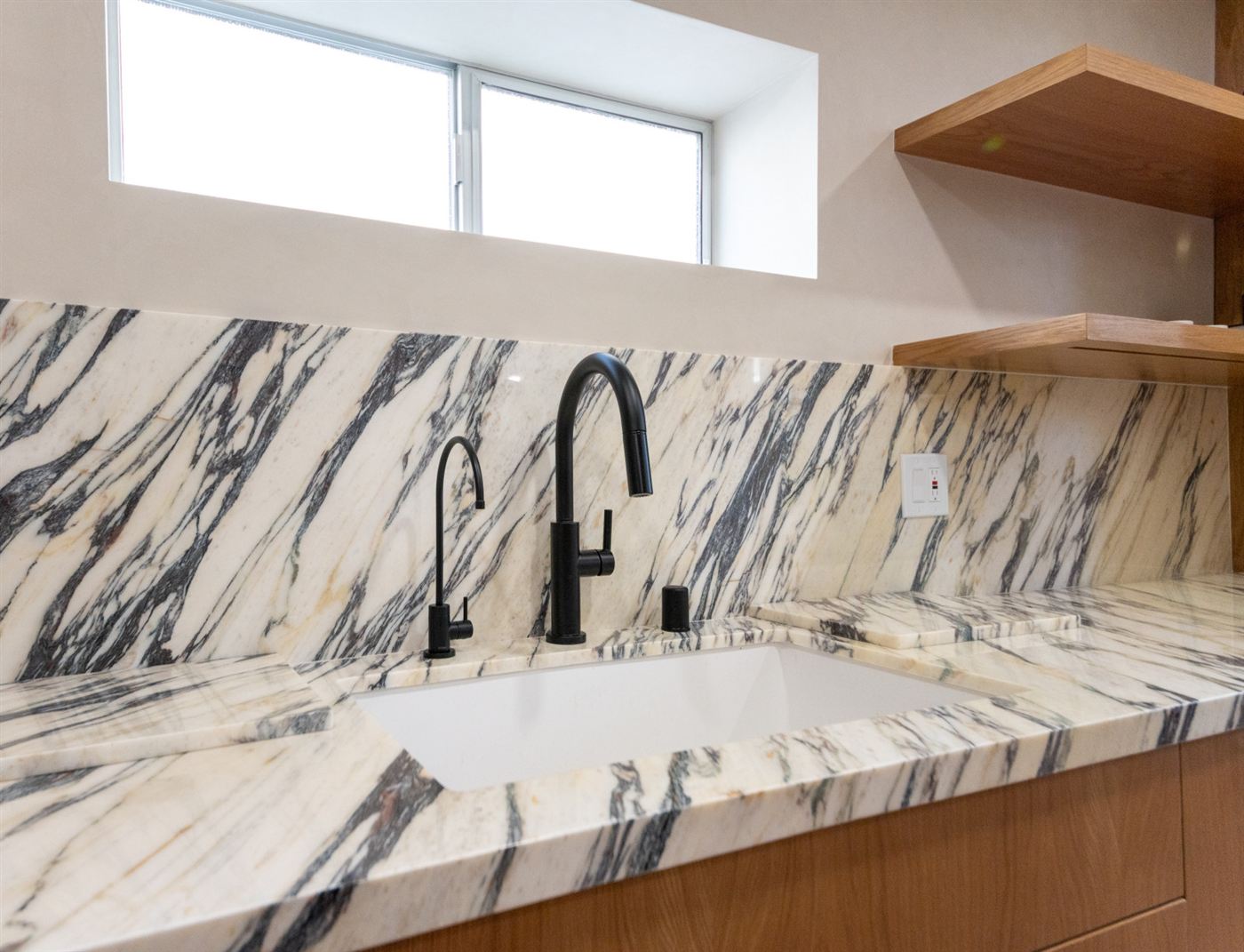 Marina del Rey kitchen remodel â€” warm wood cabinetry with clean modern lines, by ARKO Remodeling