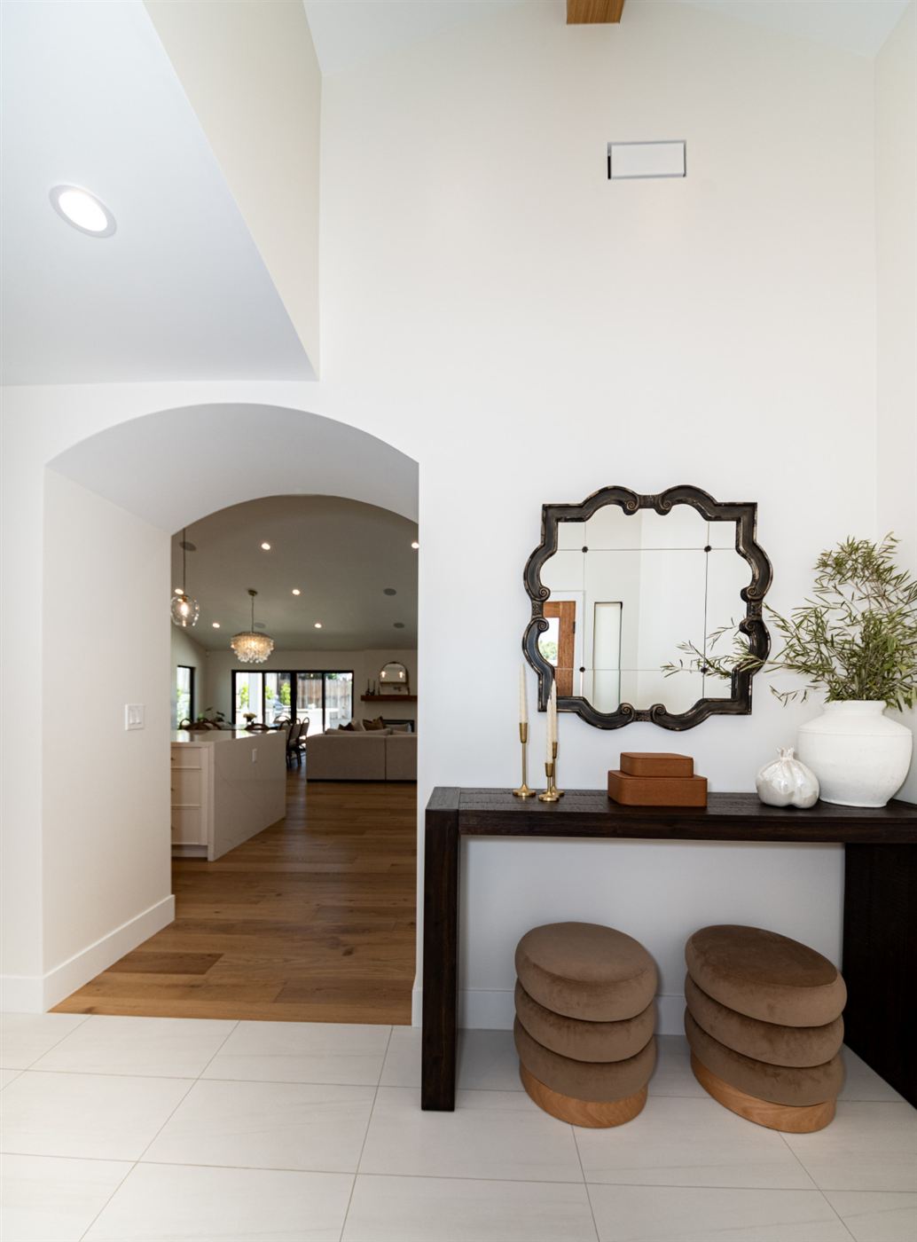 Entryway with arched opening to living space