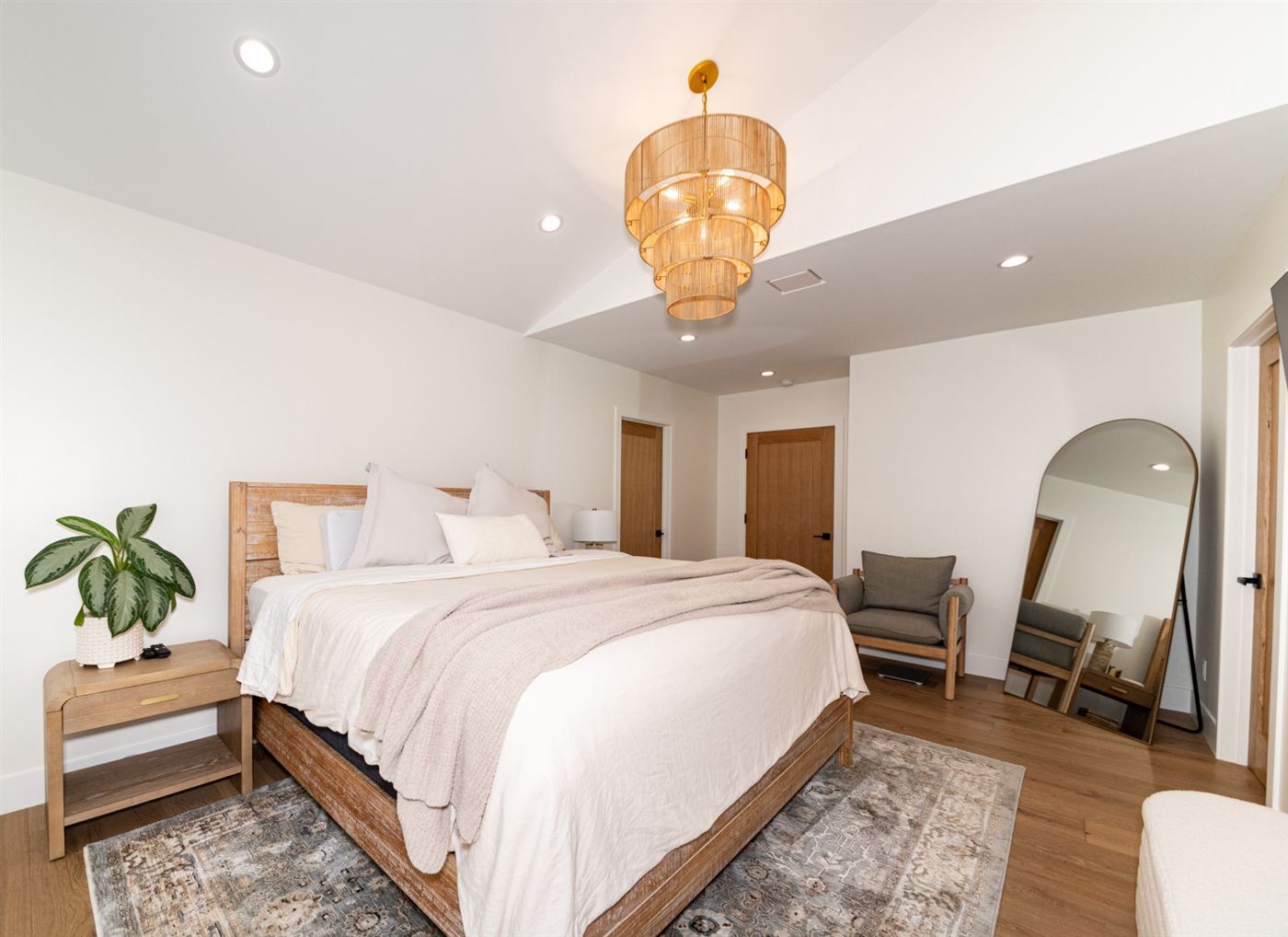 Modern bedroom with wood doors