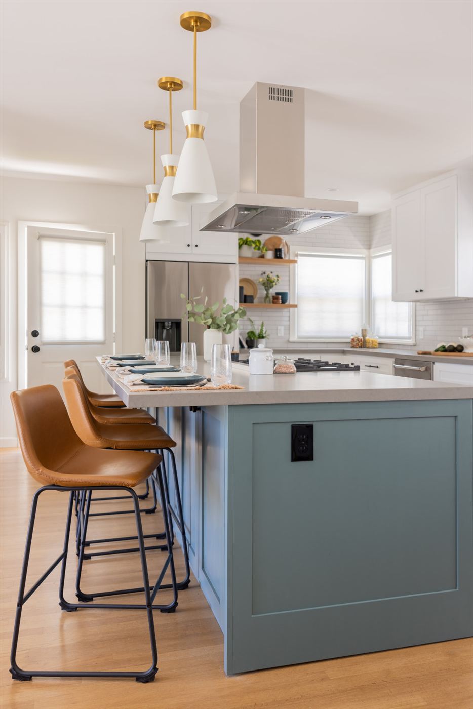 Farmhouse modern kitchen with soft blue island and light quartz counters